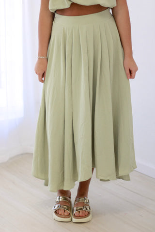 In the Moment Pleated Midi Skirt in Light Olive
