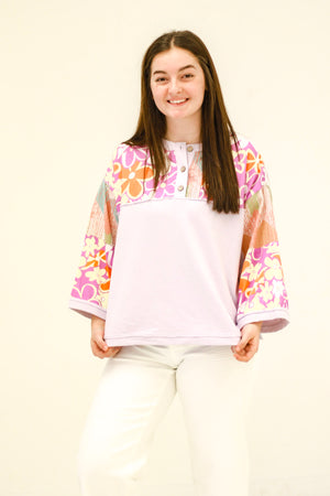 Spring in is the Air Purple Top with Floral Detail