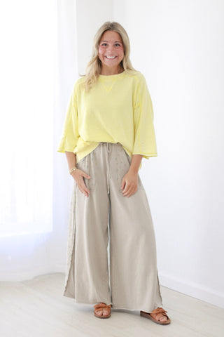 A Flirt with Floral Pants in Sage Gray