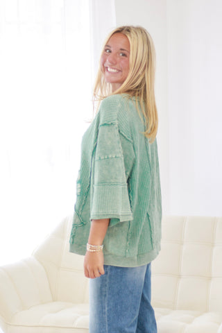 Tied Up In You Pullover in Teal Blue