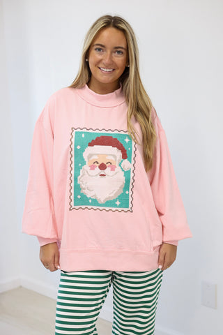 Postage Stamp Santa Pullover in Pink